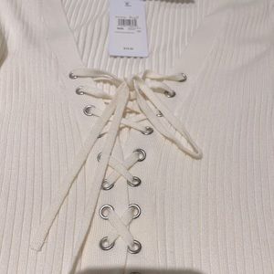 GUESS brand NEW. Medium. Long sleeve lace front sweater. Cream